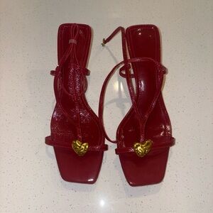 Elegant Red Strappy Sandals with Heart Detail